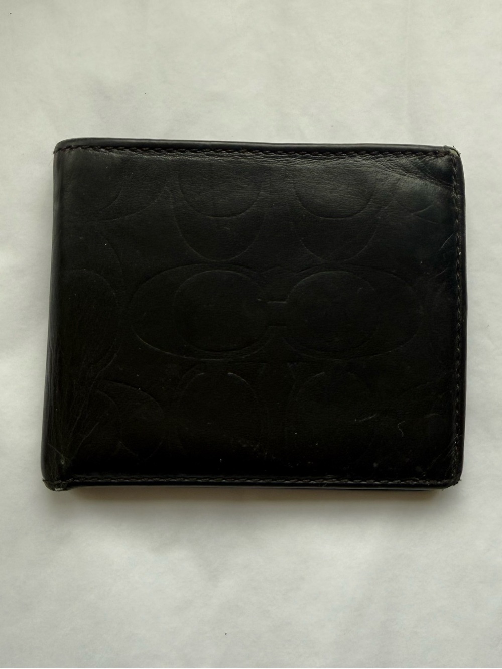 Vintage Coach Men’s Black Embossed Signature Leather Bifold Wallet